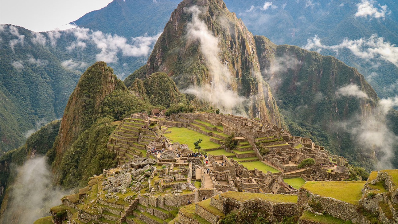 Inca Trail Finish - a daytime picture of green stone mountains of Peru