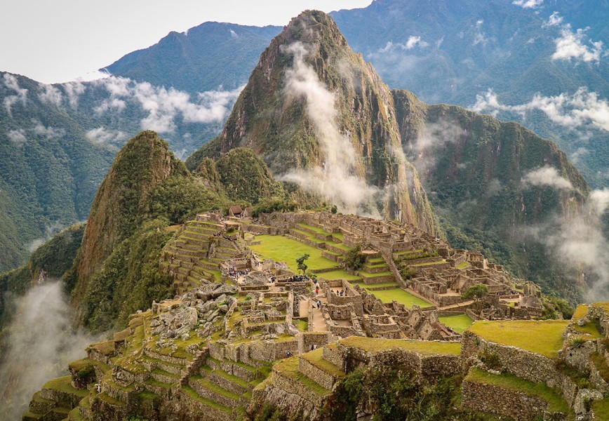 Inca Trail Finish - a daytime picture of green stone mountains of Peru