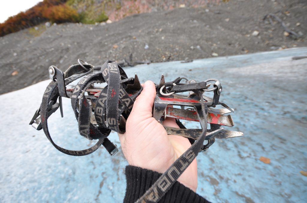 Ice cleats are worn on the boots to improve traction on the glacier