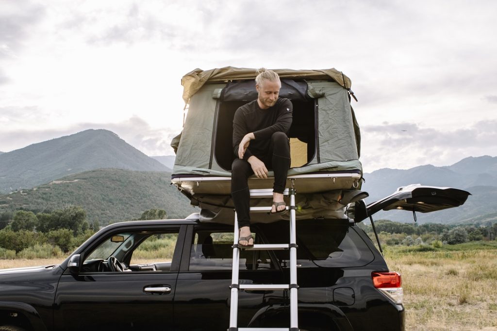 The Essential Guide to Hammocks - A person in KUHL men's baselayer top and bottom.