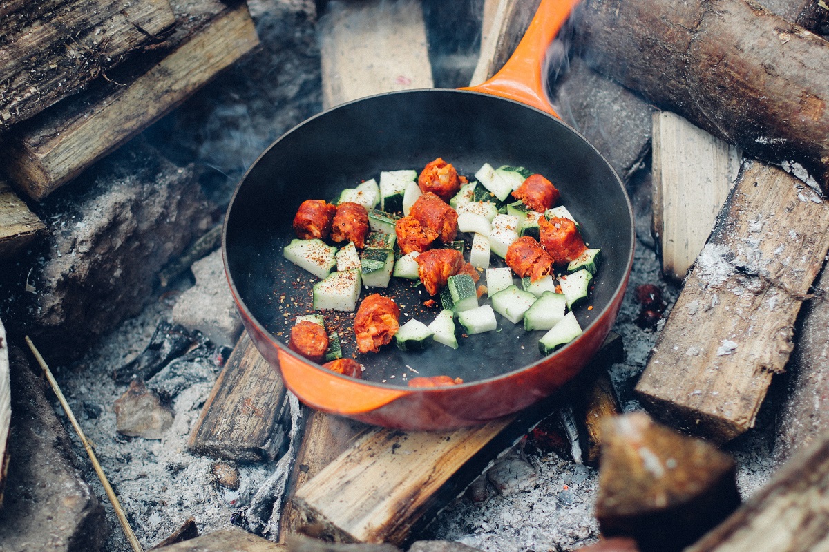 meat and vegetables in frying pan