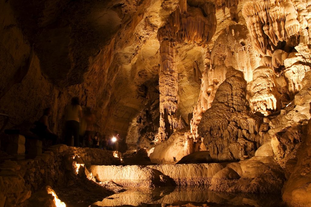 brown lightened rock formations in cave