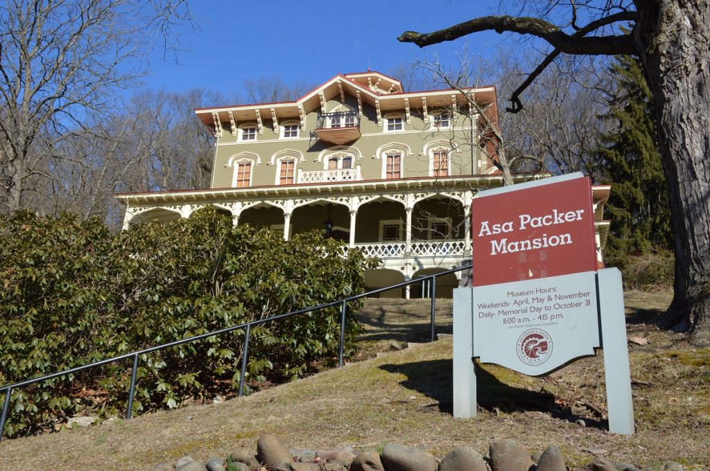 victorian house with information board in front