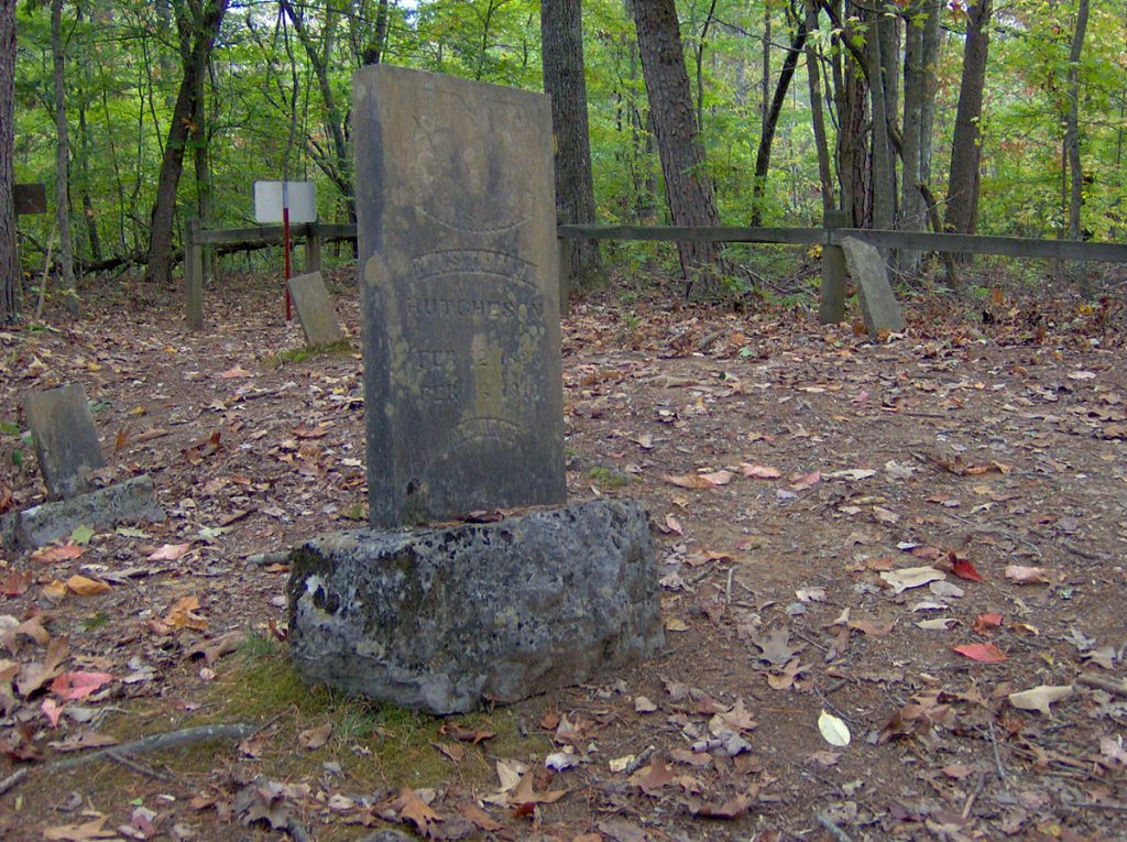 grave with letters on an old cemetery