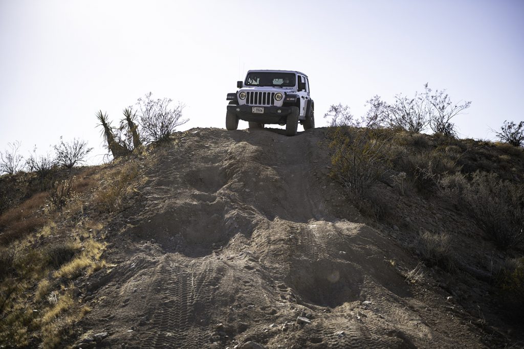 silver jeep on top of hill