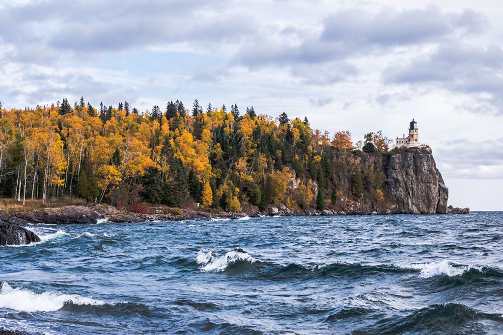 Body of water near island with trees