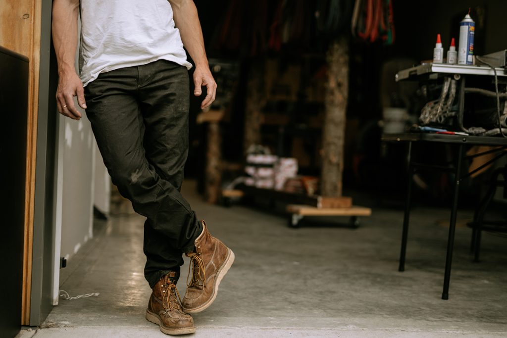 Man Standing In a Garage